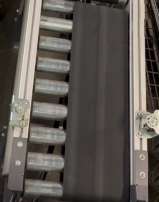 Flat belt walking on skewed frame